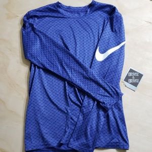 Blue Nike active shirt.
